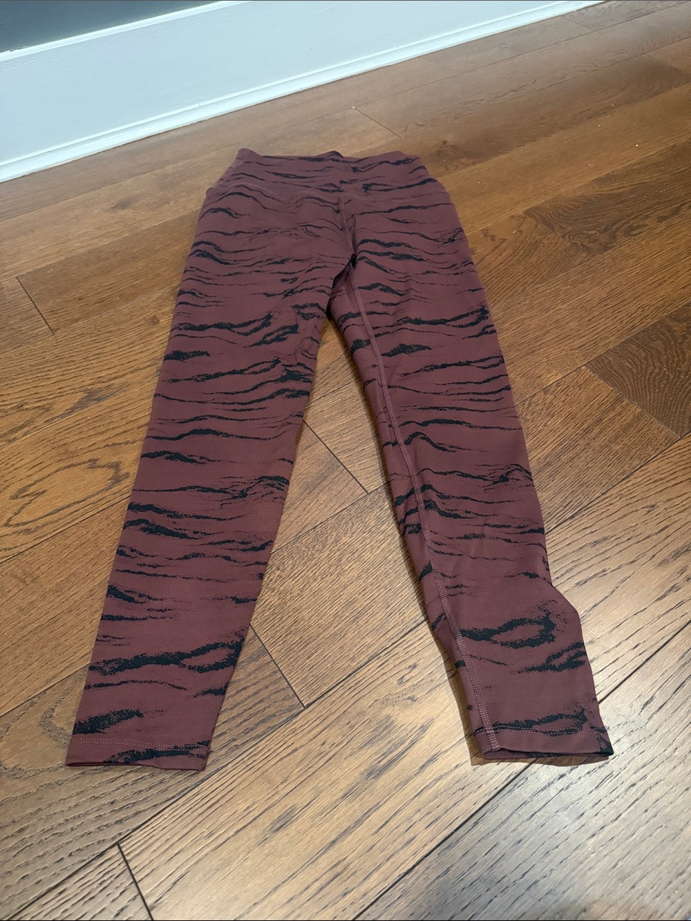 Beyond Yoga. High rise. Maroon and Black Tiger-Stripe Leggings. NWOT.